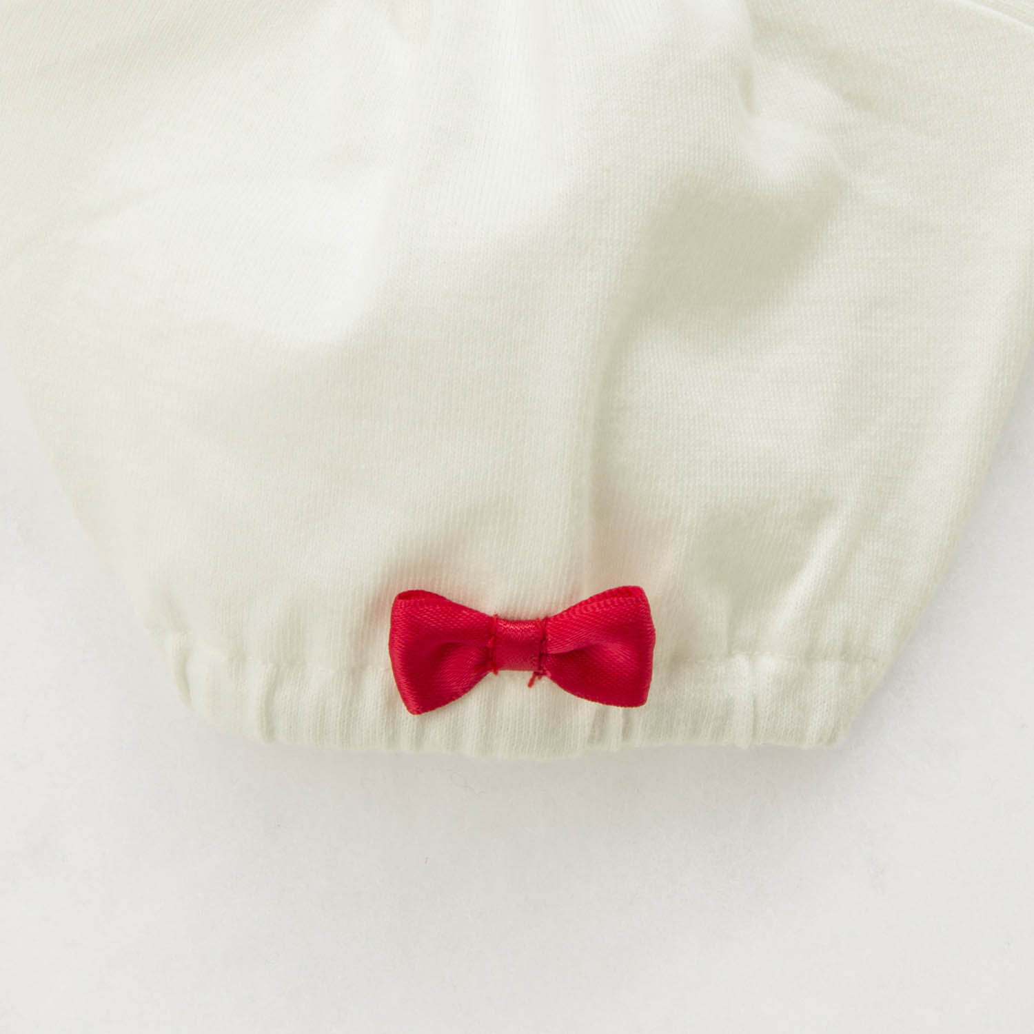 名札付けワッペン付き裾フリルパフ袖Ｔシャツ　リボン