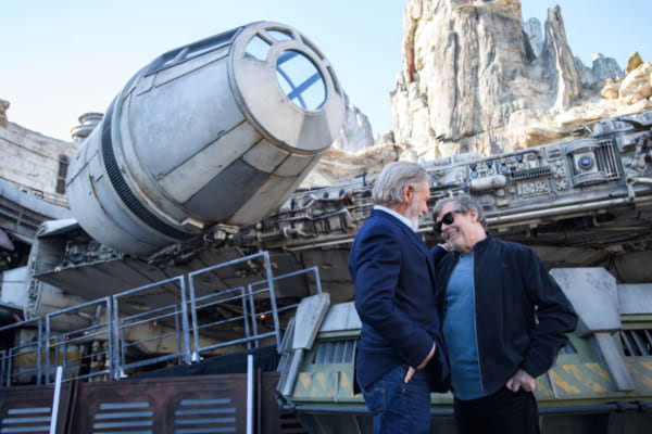 Star Wars Actors Tour Star Wars: Galaxy’s Edge at Disneyland Park Ahead of Opening Actors Harrison Ford, and Mark Hamill pose in front of the Millennium Falcon at Star Wars: Galaxy’s Edge at Disneyland Park in Anaheim, California, May 29, 2019. Star Wars: Galaxy’s Edge opens May 31, 2019, at Disneyland Resort in California and Aug. 29, 2019, at Walt Disney World Resort in Florida.  (Richard Harbaugh/Disneyland Resort)