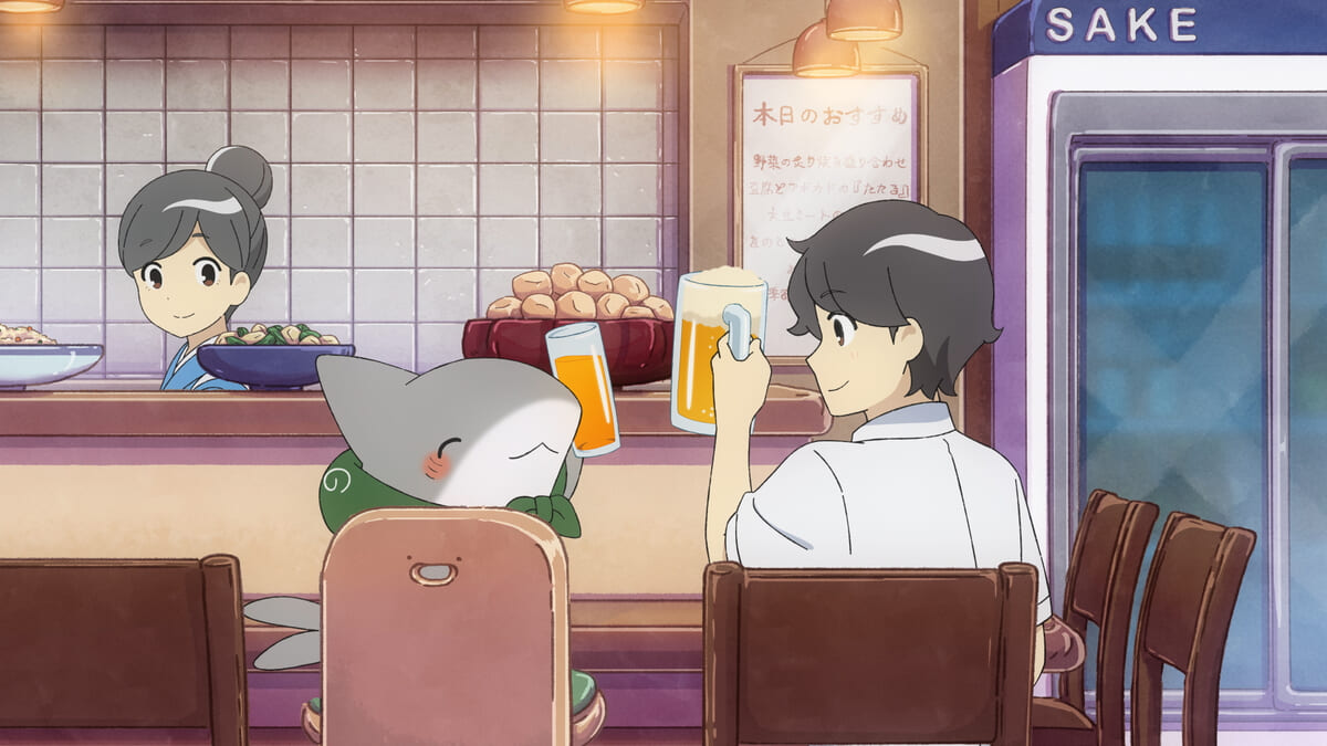 子ザメちゃんと居酒屋で乾杯をするシーン