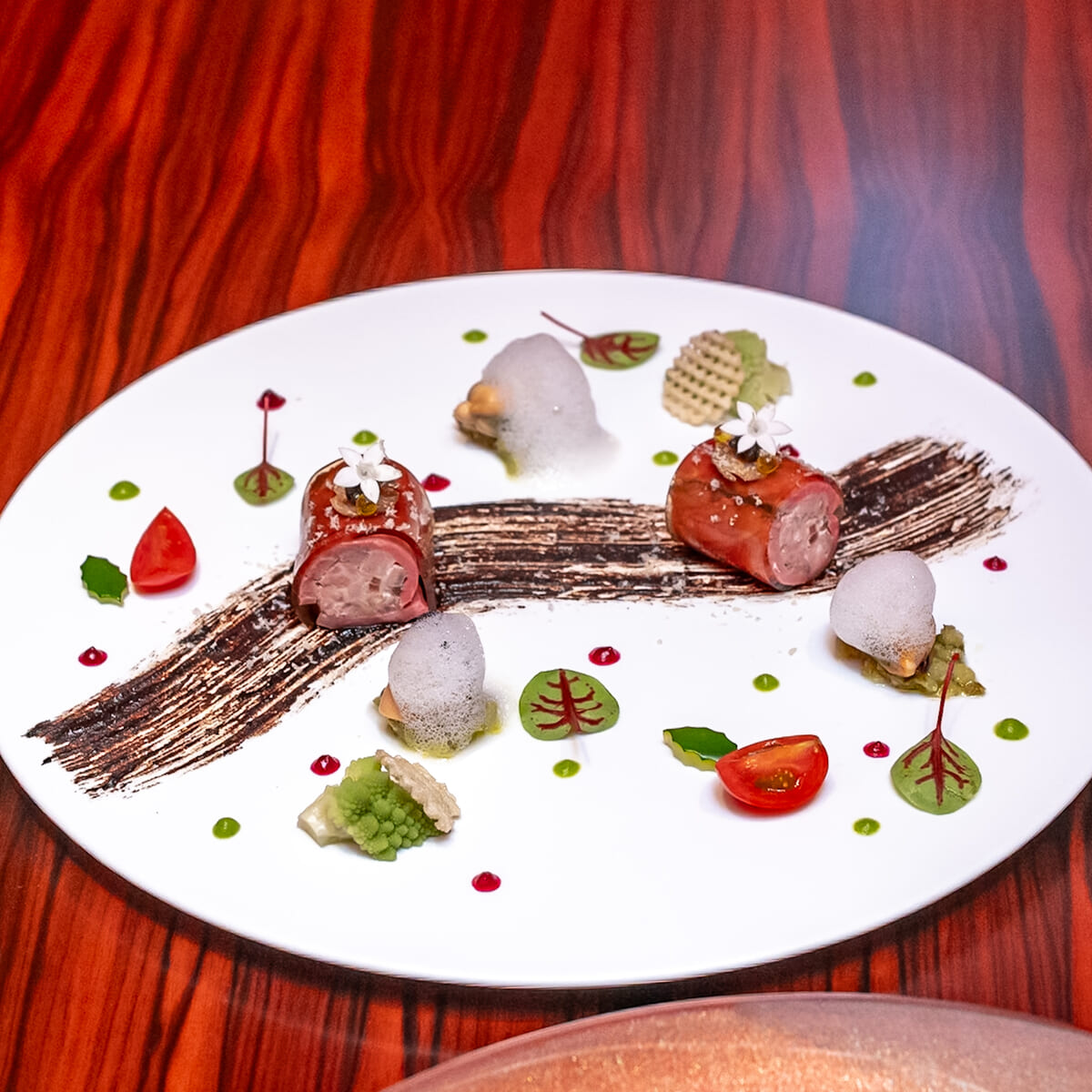 海老しんじょを纏った近江鴨のロースト コリアンダーオイルとこぶみかん香るジュ