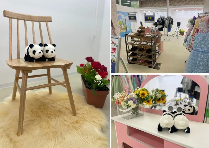 パンダのぬいぐるみを置いた木製椅子とドレッサー台、子ども用コスチュームが並ぶセルフ写真館