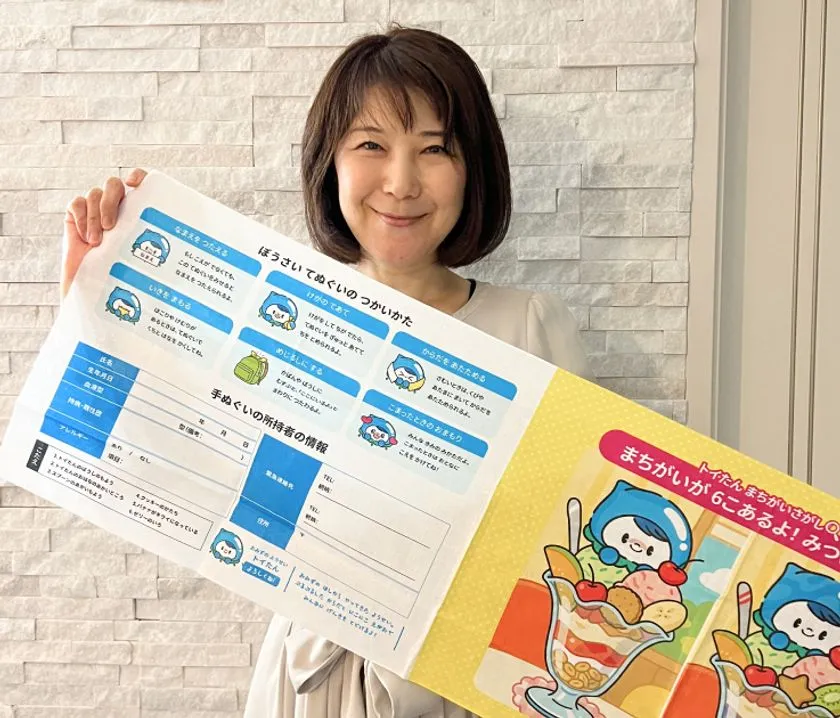 国崎様に実際にお手に取って確認していただきました