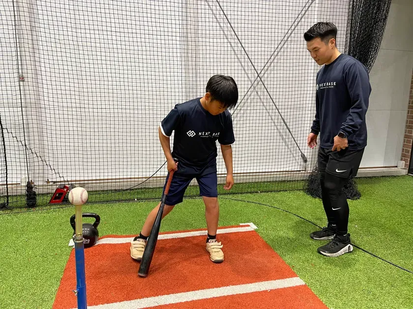 屋内でのティー打撃指導