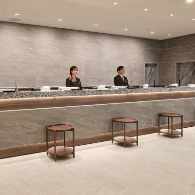 本館3階「ホテルフロント」にて参加手続き