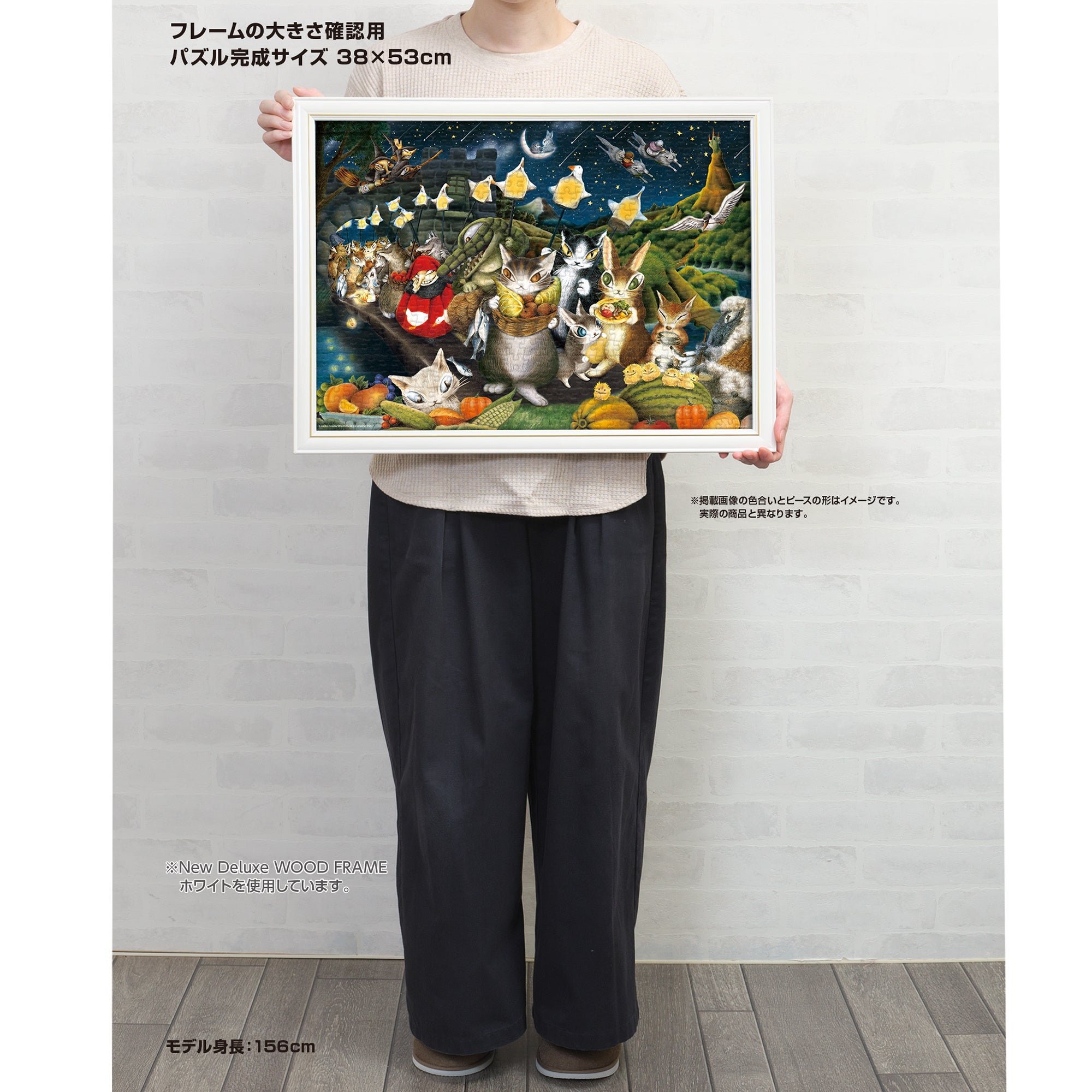 額装した『カシガリ山の収穫祭』の完成サイズ見本