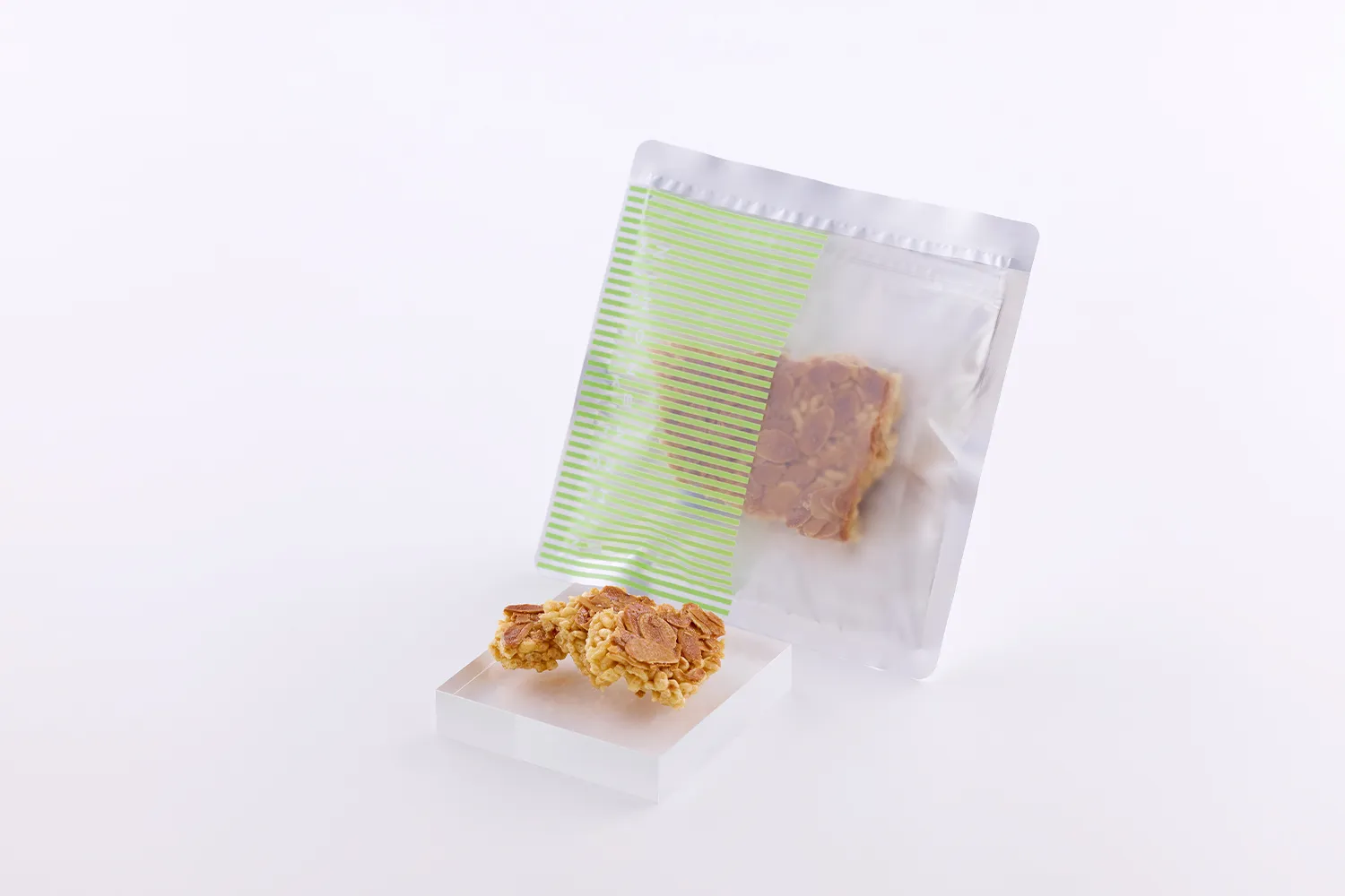 「okoshi+ フロランタン」30gの緑ストライプパッケージ