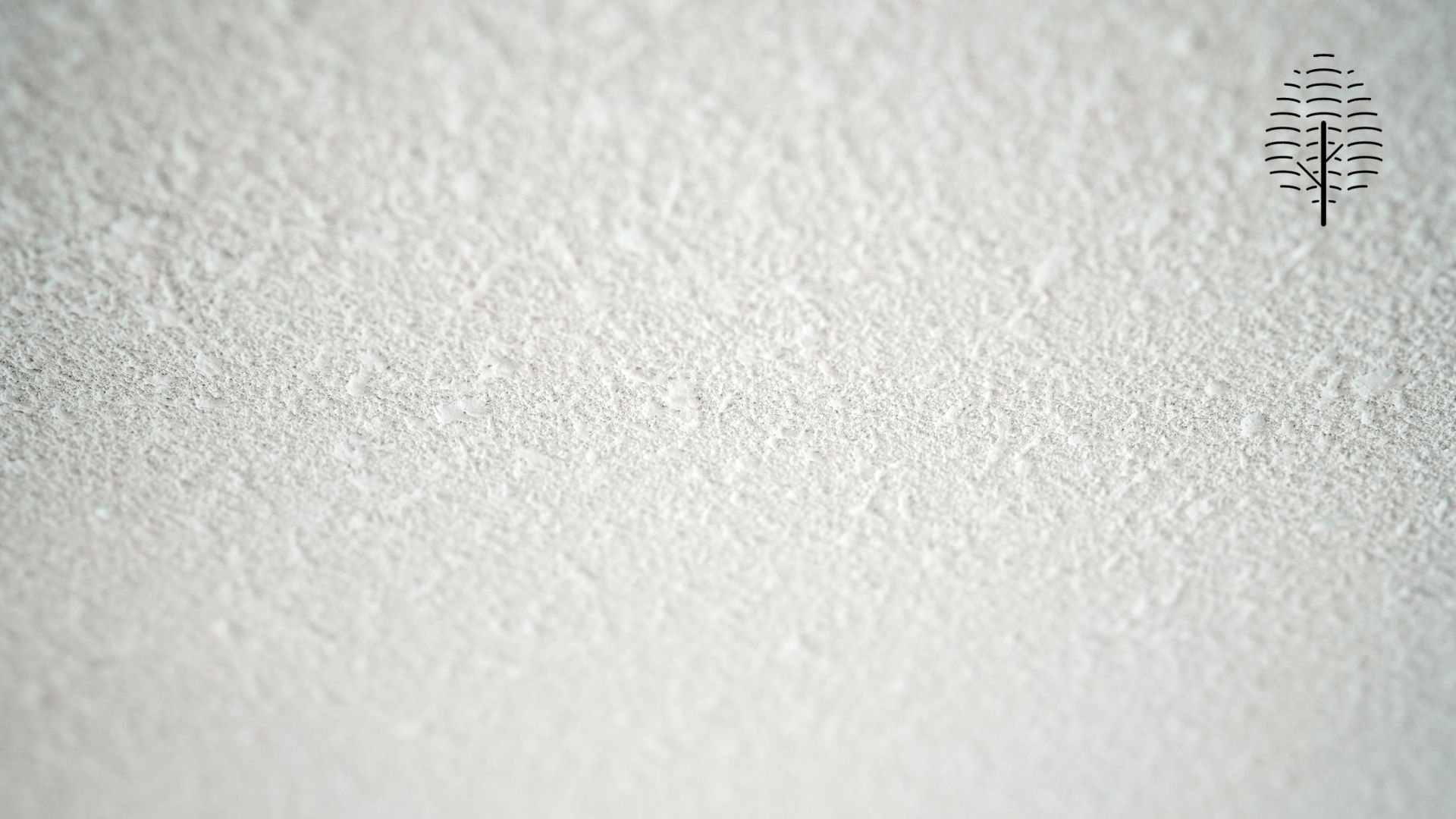 「ミ森 -MIMORI-」の客室の壁に使われたEM珪藻土の粒状の質感