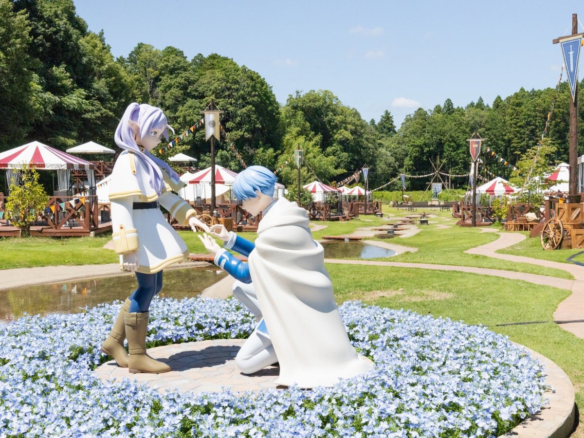 花畑に立つコラボレーションのフォトスポット像