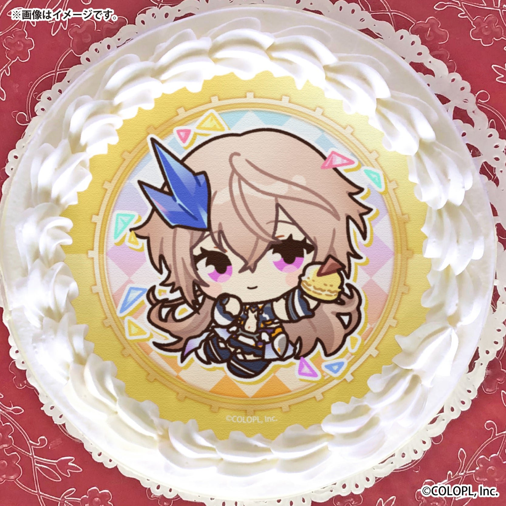 青い結晶飾りのキャラクターを描いたプリケーキ