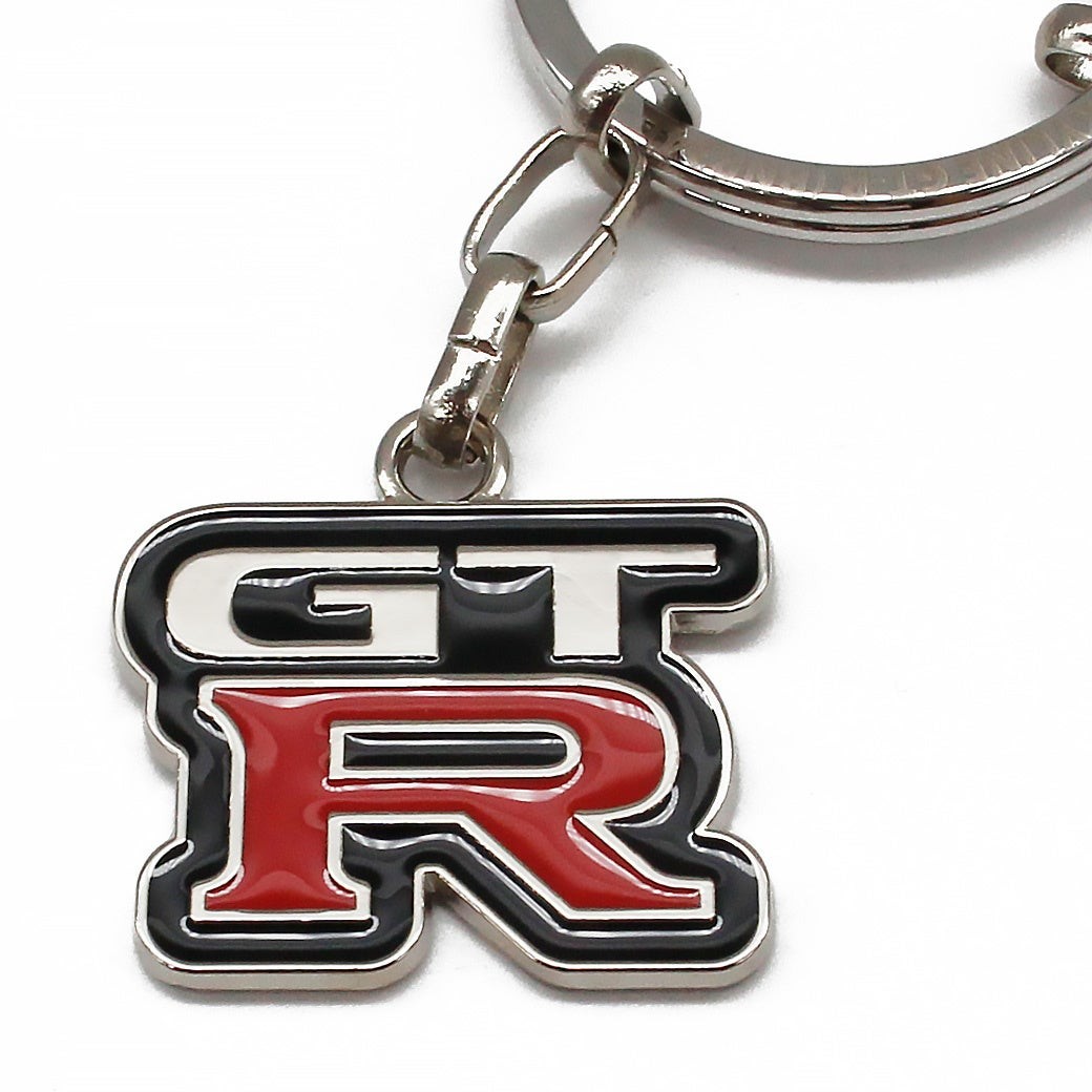 日産スカイライン GT-R(BNR34)3Dキーチェーン BLACK EDITIONのGT-Rロゴチャーム