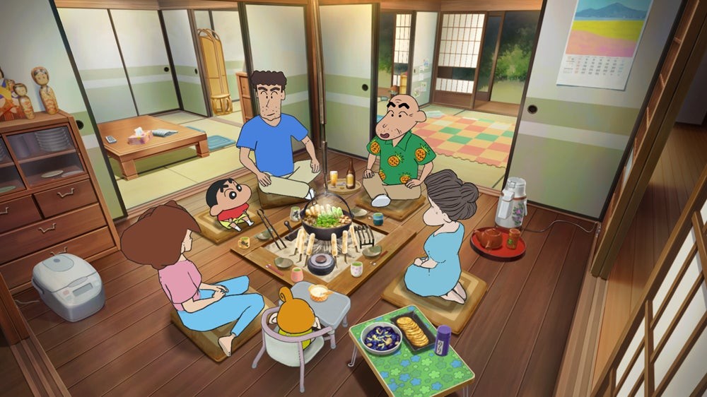 『炭の町のシロ』野原一家が食卓を囲む場面